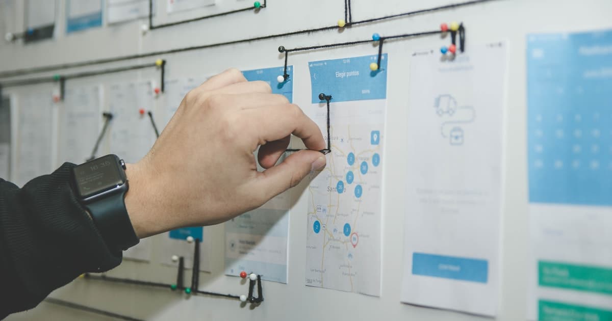 Project timeline whiteboard showing website development phases from discovery through launch